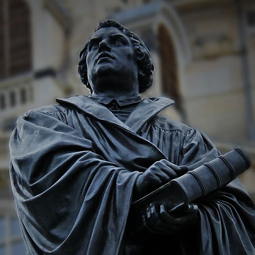 Martin Luther Statue holding bible